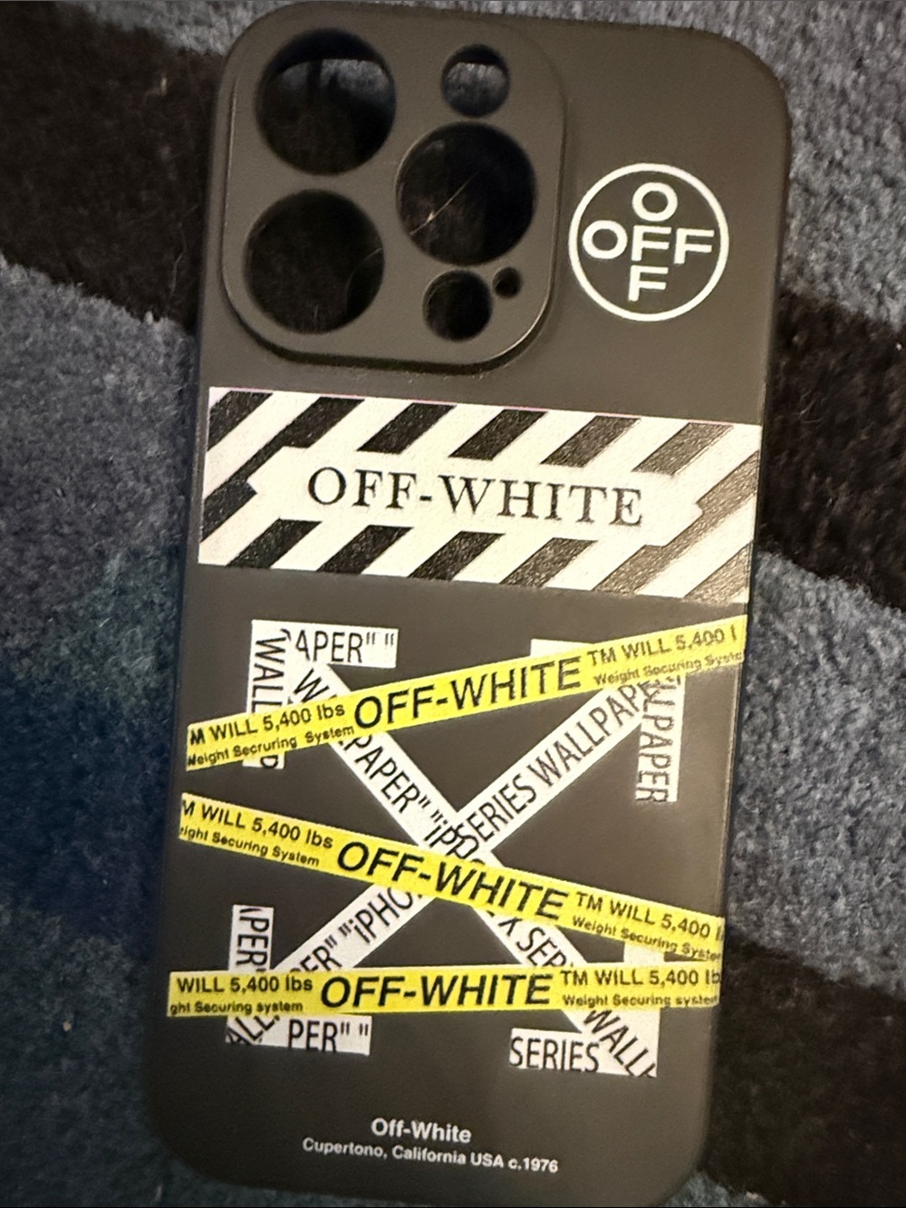 Off-White Black Phone Case with White Logo and Yellow Tape Graphic